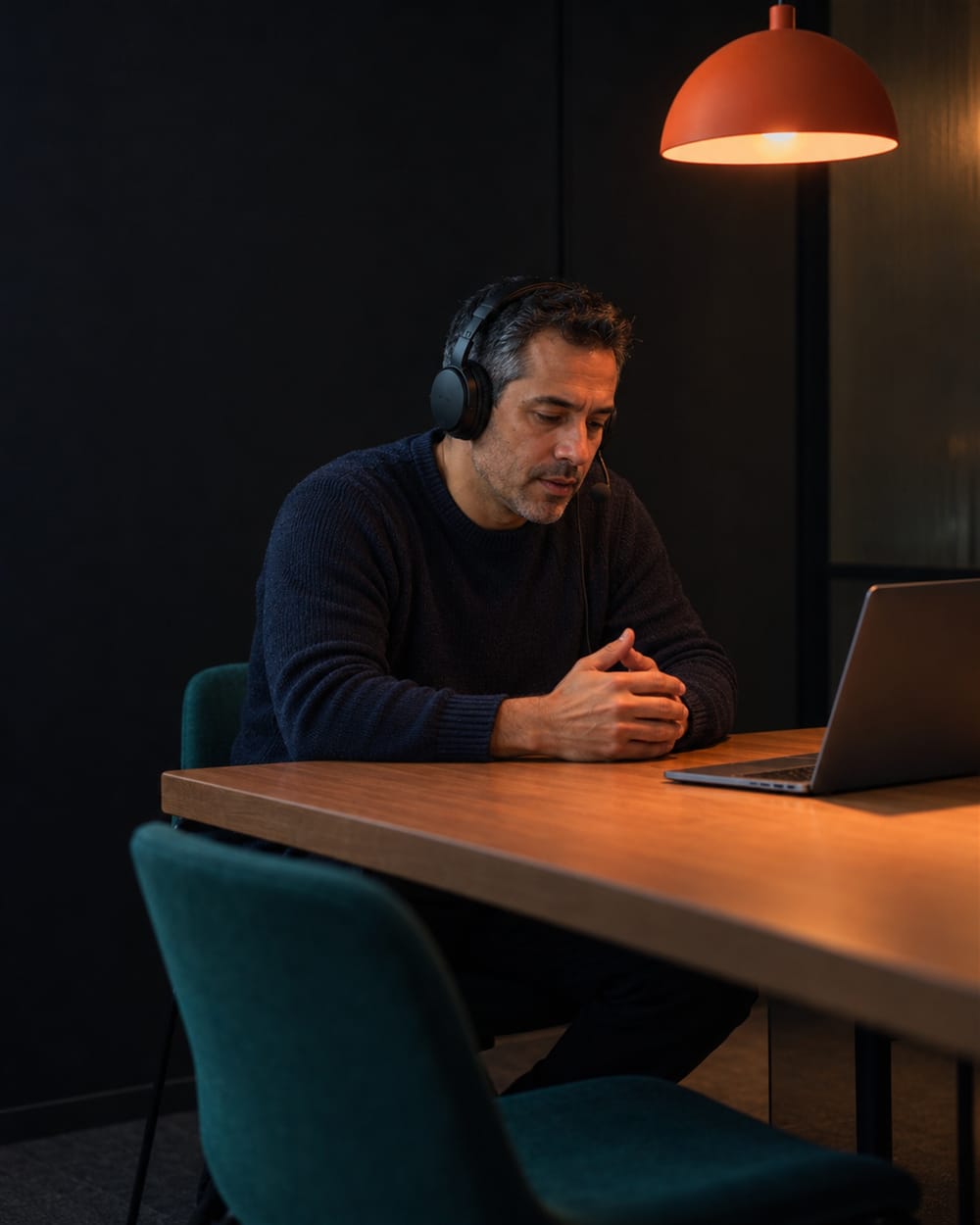 A manager rehearsing a conversation on a call before a one-on-one